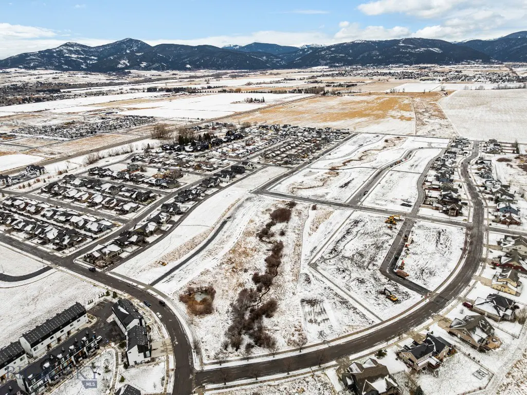 Winter aerial view of Meadow Bridge homesites and roads
